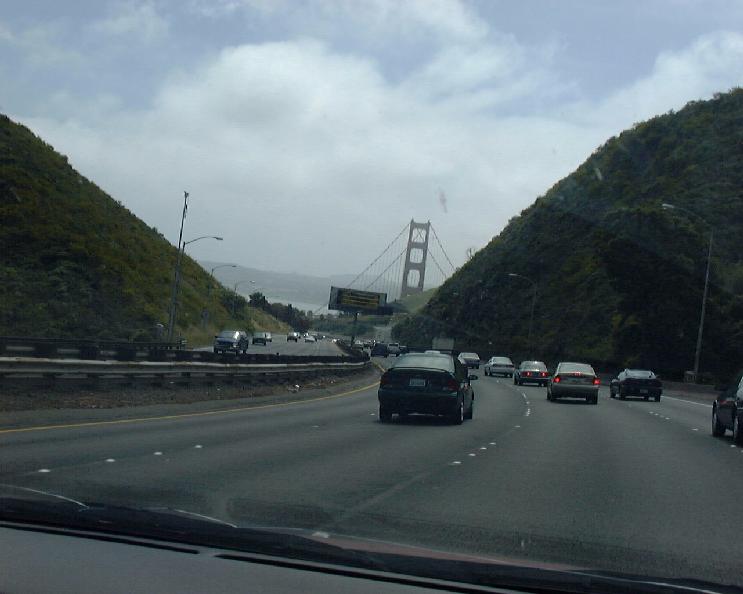 Golden Gate bridge hovers into sight.