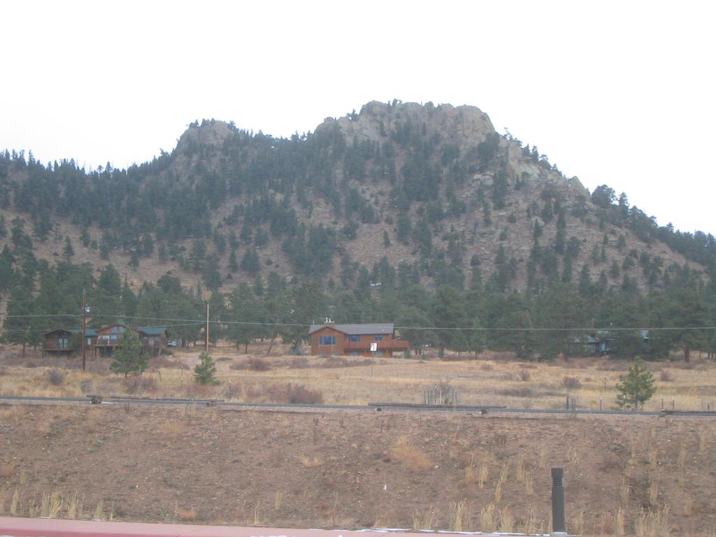 That mountain is sneaking up on that house.