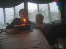 Blowing out the candles.